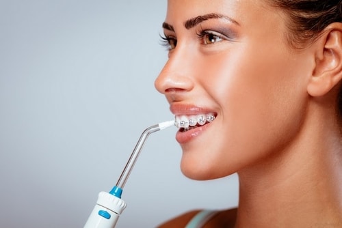 CSS water flosser woman smile RESIZED