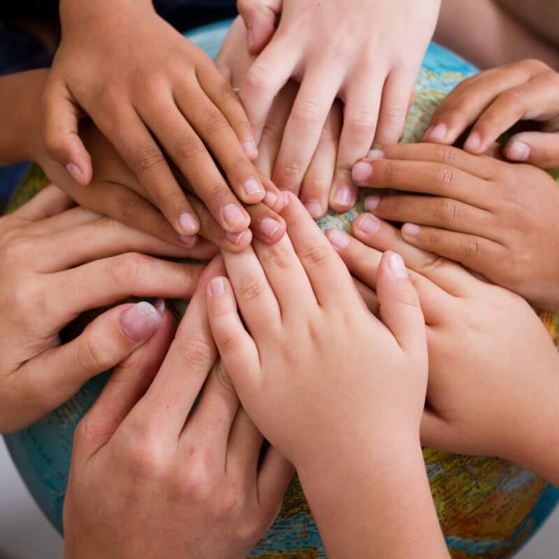 Diversity,Kids,Hands,Together,On,Globe