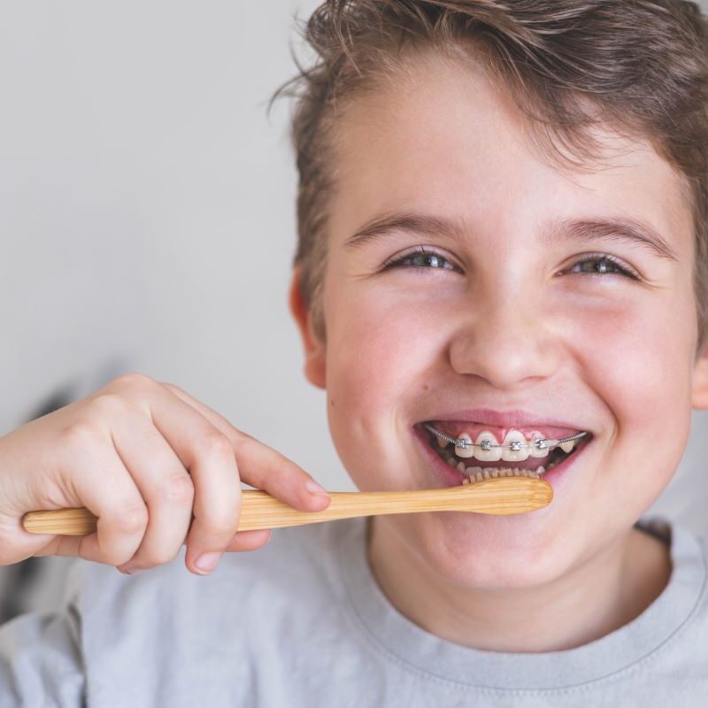 Boy with braces smiling in San Francisco, California